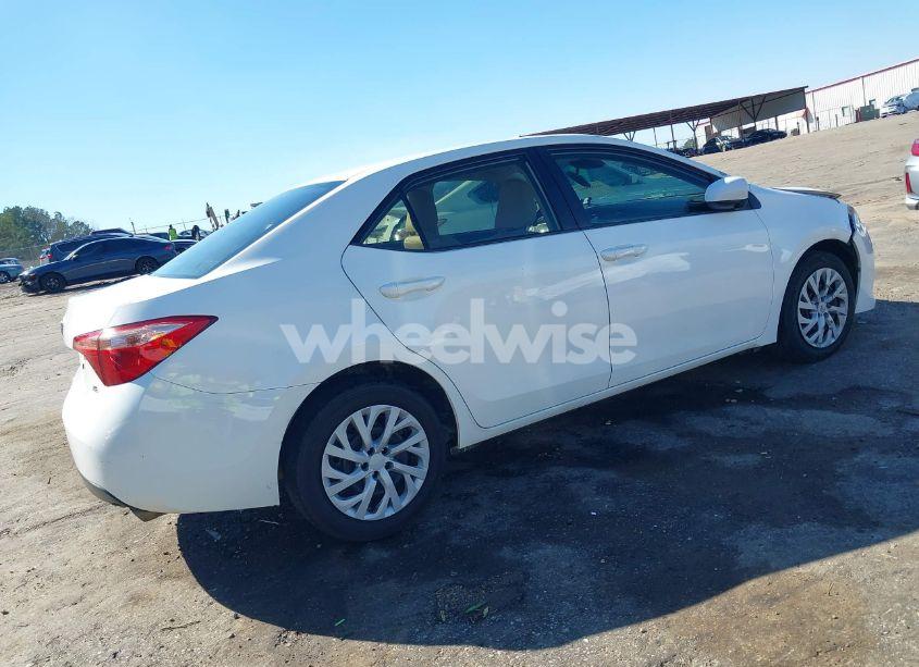 Photo 4 of 2017 Toyota Corolla LE (VIN 5YFBURHE4HP580792)