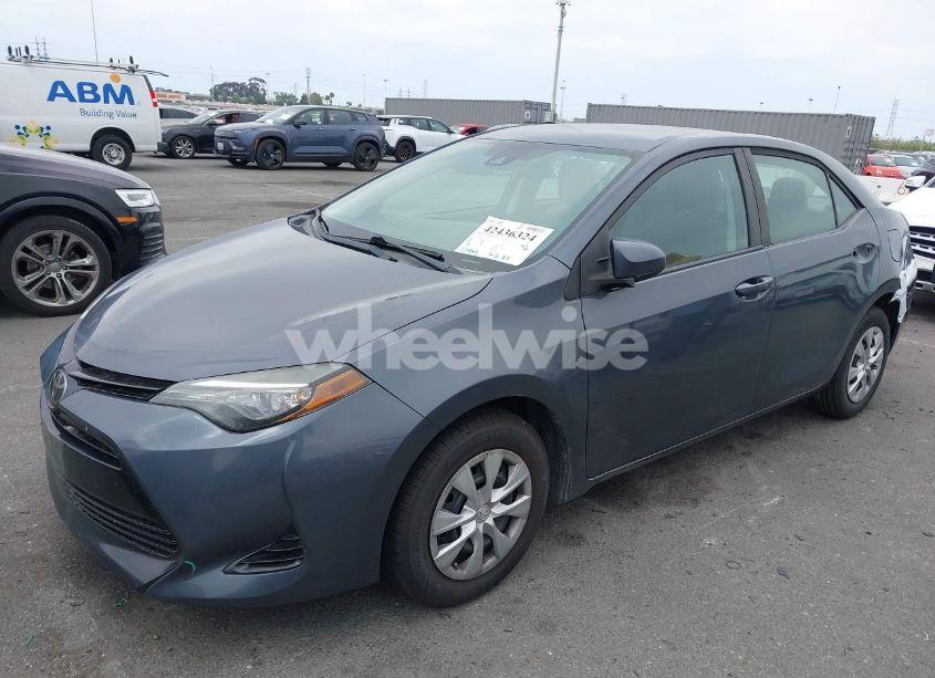 Photo 2 of 2017 Toyota Corolla L (VIN 5YFBURHE4HP598340)