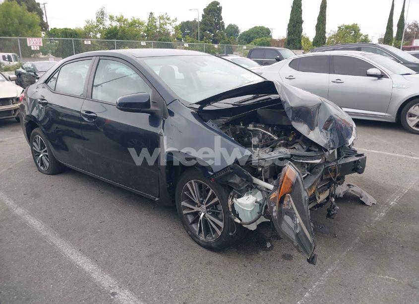 2017 Toyota Corolla LE (VIN 5YFBURHE4HP657435) main photo