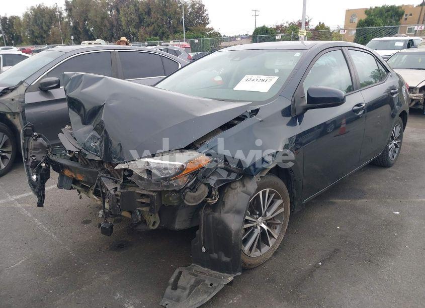 Photo 2 of 2017 Toyota Corolla LE (VIN 5YFBURHE4HP657435)