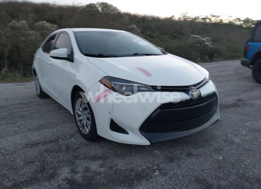 2017 Toyota Corolla LE (VIN 5YFBURHE4HP662943) main photo
