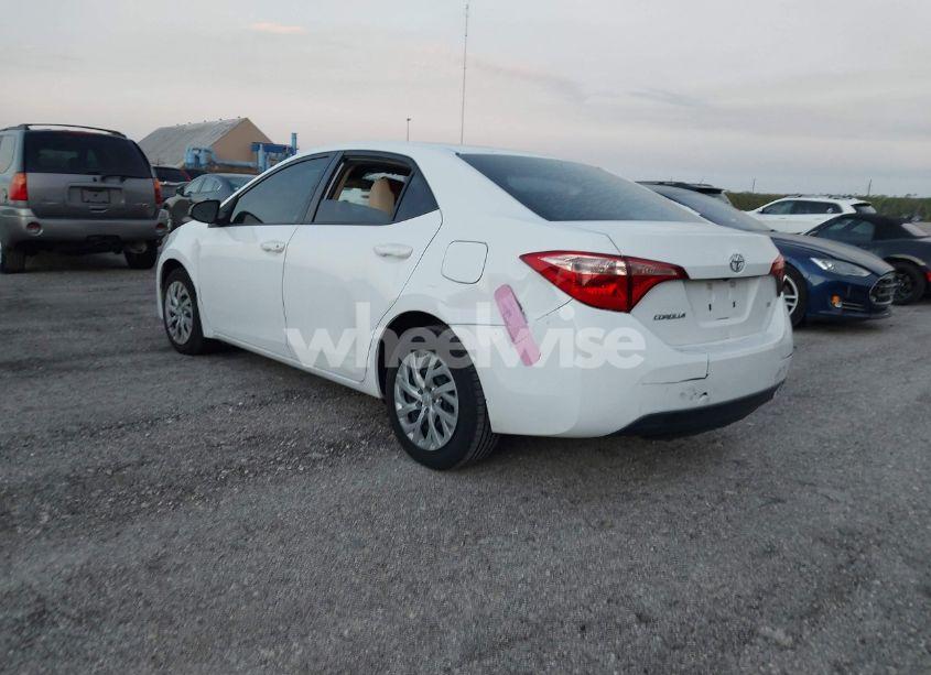 Photo 3 of 2017 Toyota Corolla LE (VIN 5YFBURHE4HP662943)