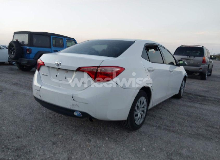 Photo 4 of 2017 Toyota Corolla LE (VIN 5YFBURHE4HP662943)