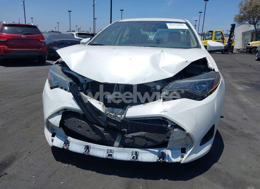 Photo 6 of 2017 Toyota Corolla LE (VIN 5YFBURHE4HP675062)