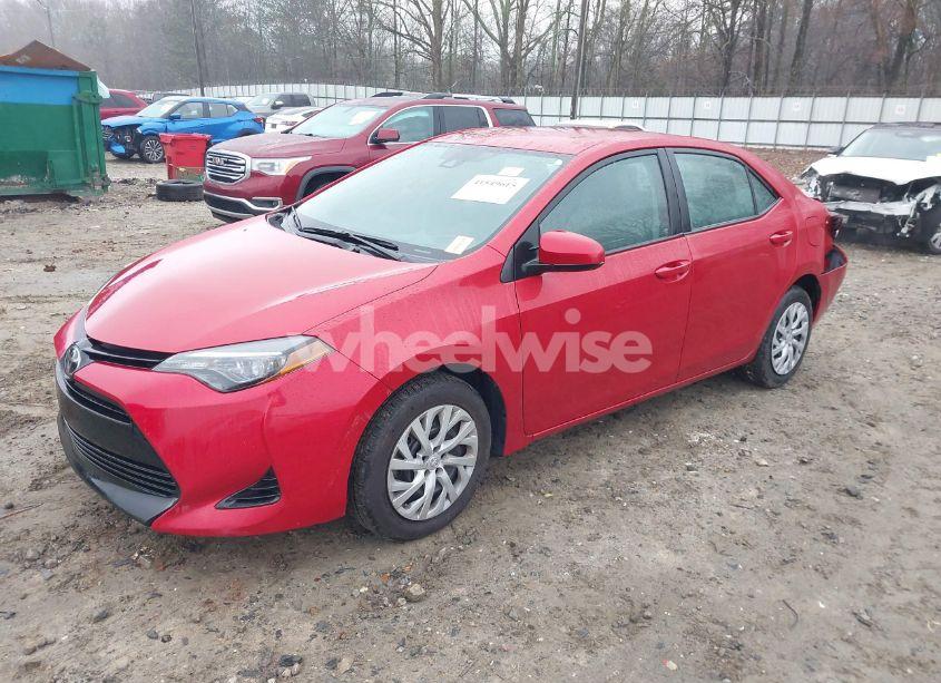 Photo 2 of 2017 Toyota Corolla LE (VIN 5YFBURHE4HP675529)