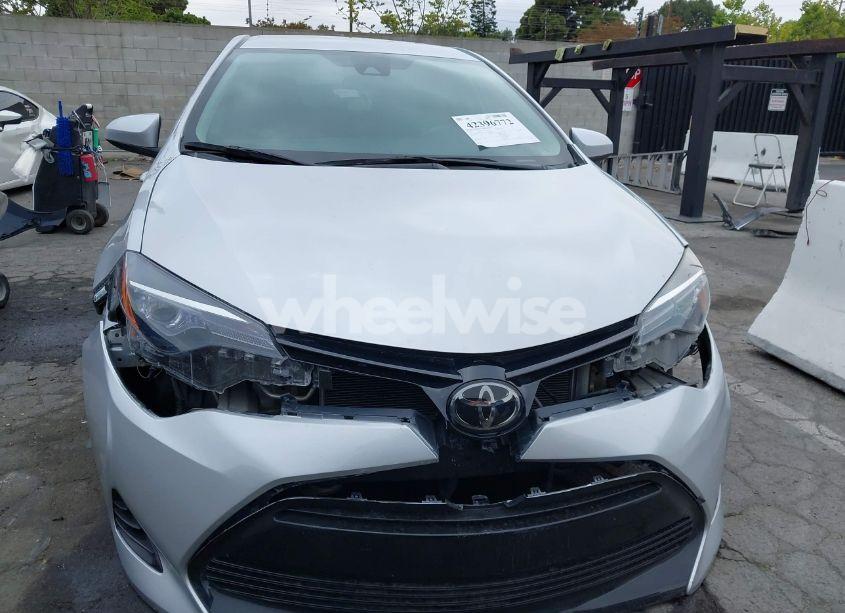 Photo 6 of 2018 Toyota Corolla LE (VIN 5YFBURHE4JP765818)