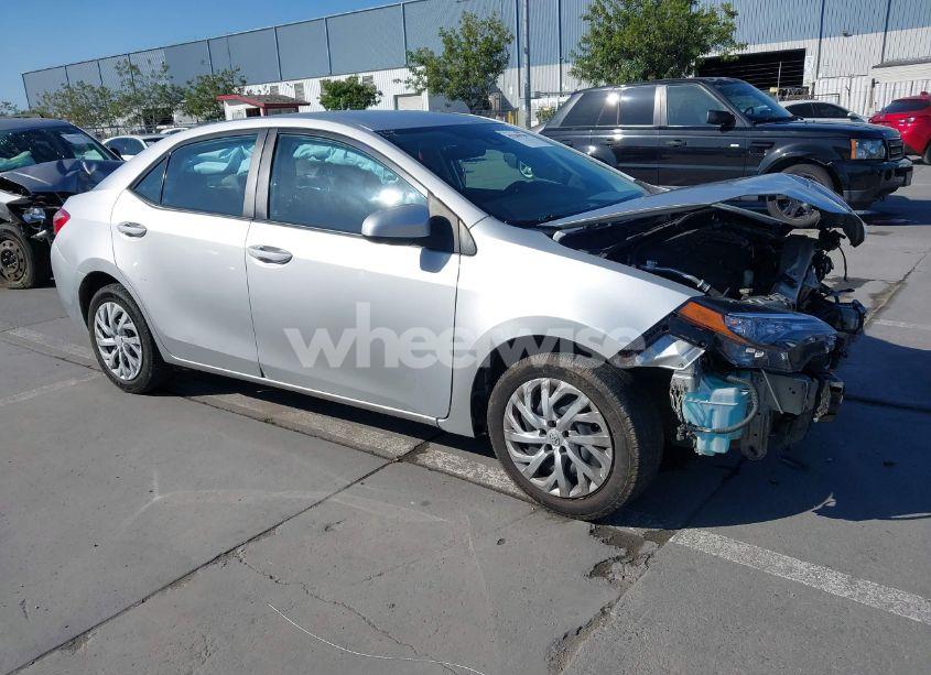 2017 Toyota Corolla LE (VIN 5YFBURHE5HP569817) main photo