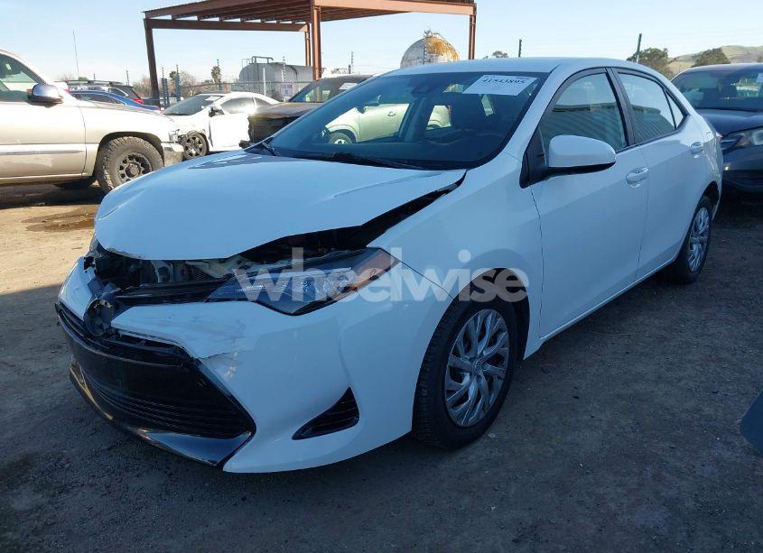 Photo 2 of 2017 Toyota Corolla LE (VIN 5YFBURHE5HP639431)