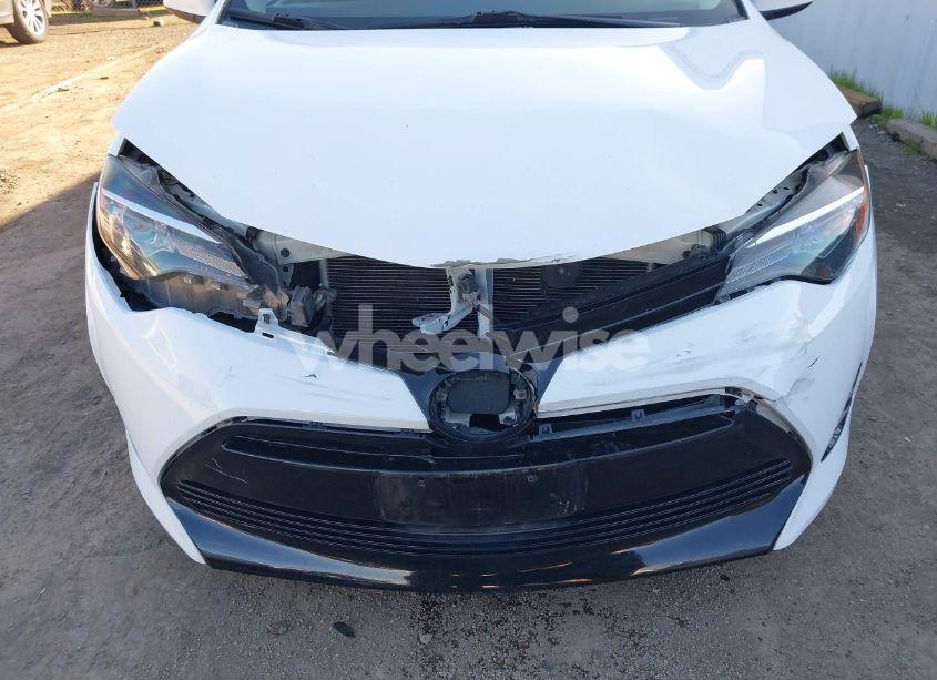 Photo 6 of 2017 Toyota Corolla LE (VIN 5YFBURHE5HP639431)