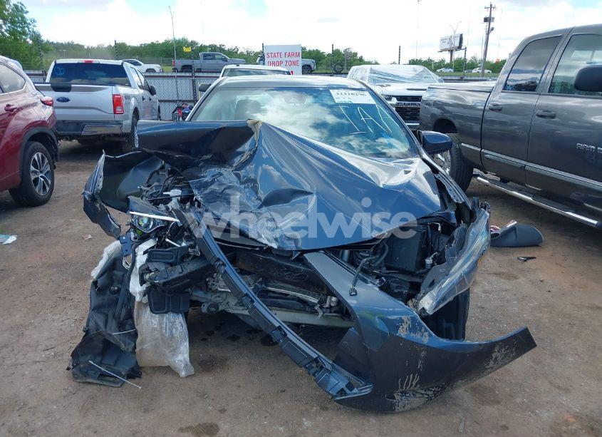 Photo 12 of 2017 Toyota Corolla L (VIN 5YFBURHE5HP673143)