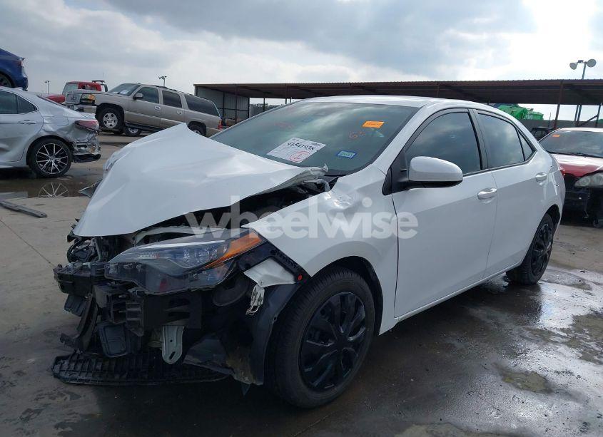 Photo 2 of 2017 Toyota Corolla LE (VIN 5YFBURHE5HP677807)