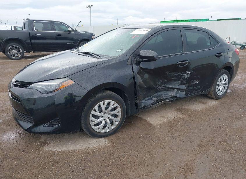 Photo 2 of 2017 Toyota Corolla LE (VIN 5YFBURHE5HP699970)