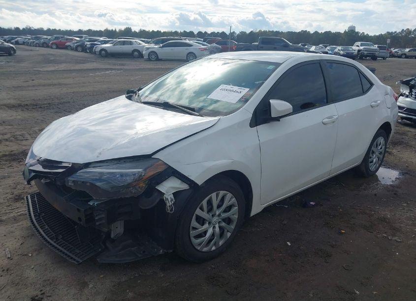 Photo 2 of 2017 Toyota Corolla LE (VIN 5YFBURHE5HP705783)