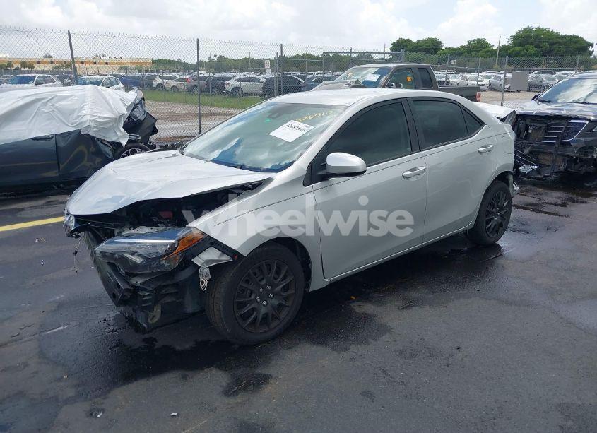 Photo 2 of 2017 Toyota Corolla LE (VIN 5YFBURHE5HP713219)