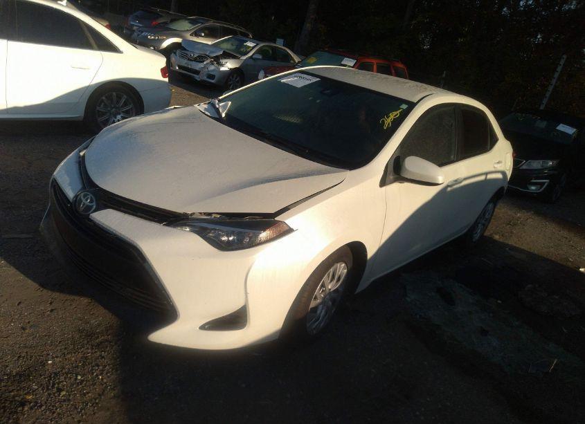 Photo 2 of 2017 Toyota Corolla LE (VIN 5YFBURHE5HP725564)