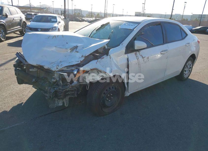 Photo 2 of 2018 Toyota Corolla LE (VIN 5YFBURHE5JP762992)
