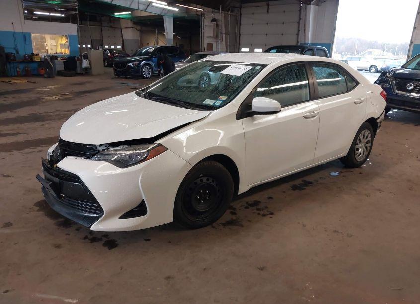 Photo 2 of 2017 Toyota Corolla LE (VIN 5YFBURHE6HP573827)