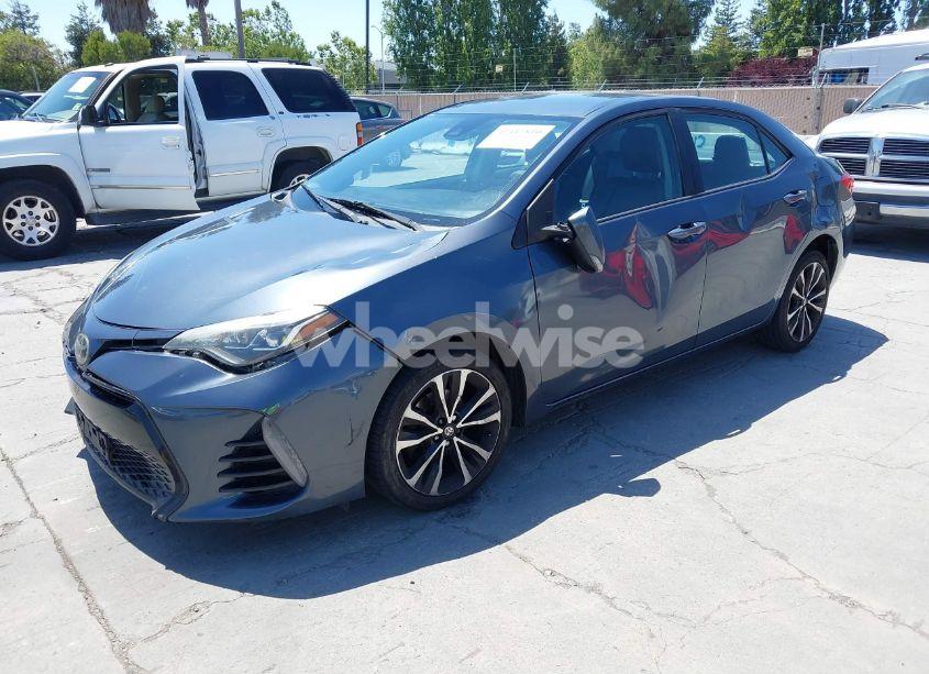 Photo 2 of 2017 Toyota Corolla SE (VIN 5YFBURHE6HP575352)