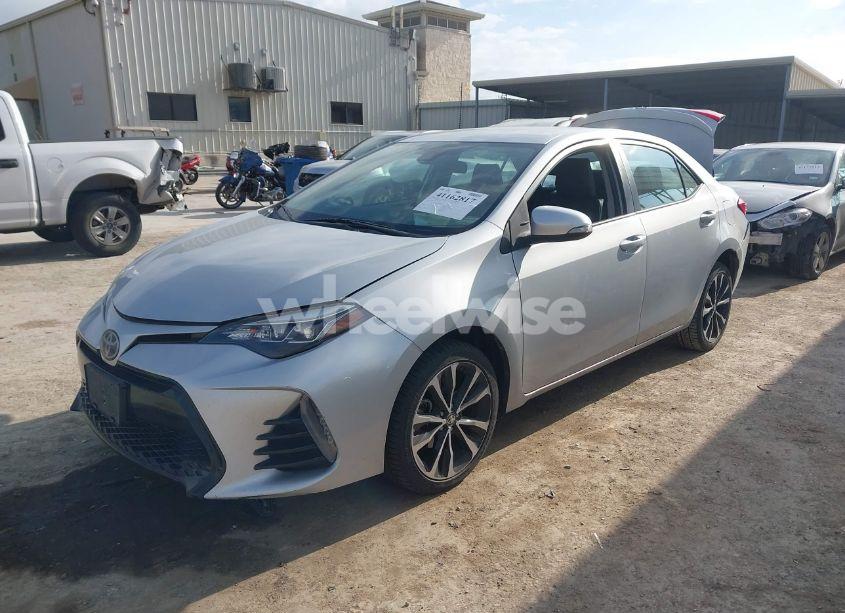 Photo 2 of 2017 Toyota Corolla SE (VIN 5YFBURHE6HP600685)