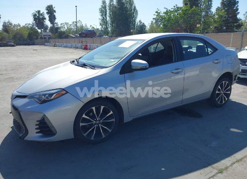 Photo 2 of 2017 Toyota Corolla SE (VIN 5YFBURHE6HP652091)