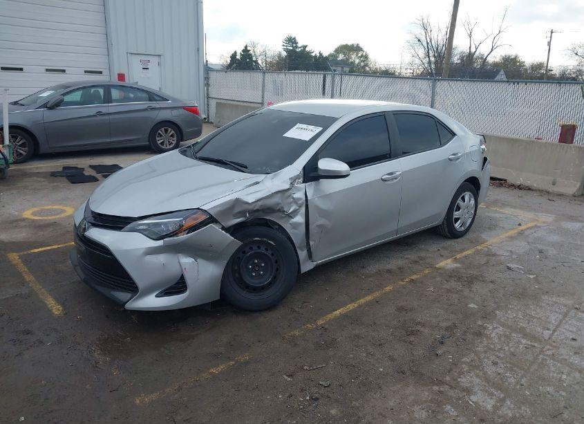 Photo 2 of 2017 Toyota Corolla LE (VIN 5YFBURHE6HP663933)