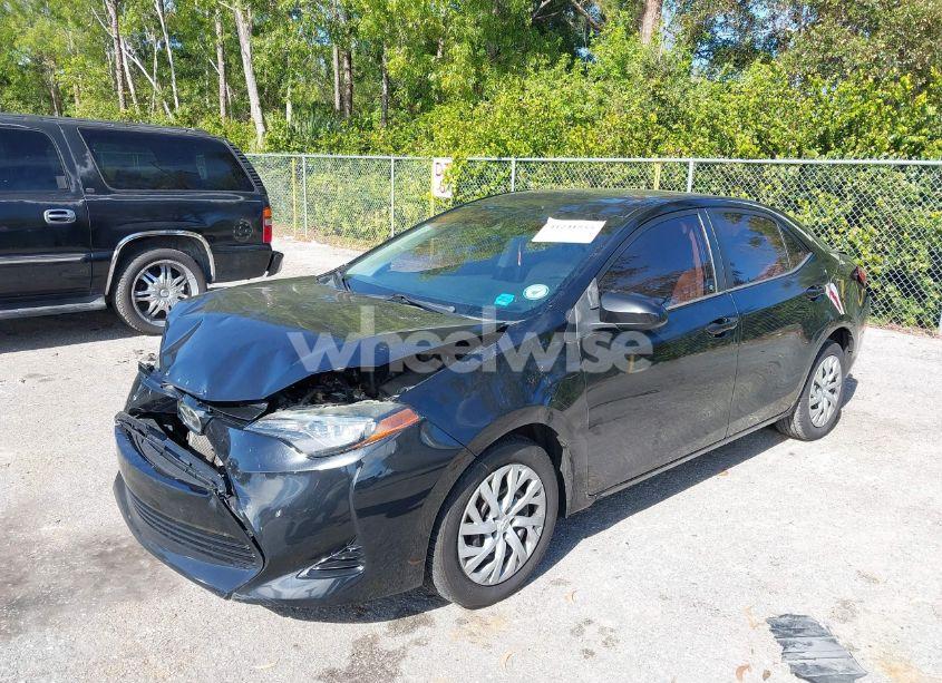 Photo 2 of 2017 Toyota Corolla LE (VIN 5YFBURHE6HP670476)