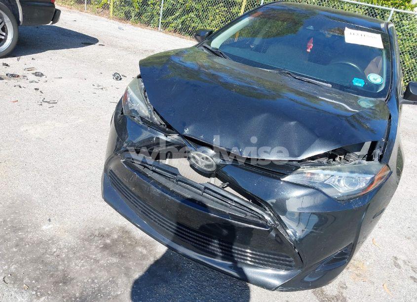 Photo 6 of 2017 Toyota Corolla LE (VIN 5YFBURHE6HP670476)