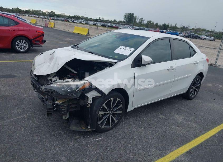 Photo 2 of 2017 Toyota Corolla SE (VIN 5YFBURHE6HP671997)