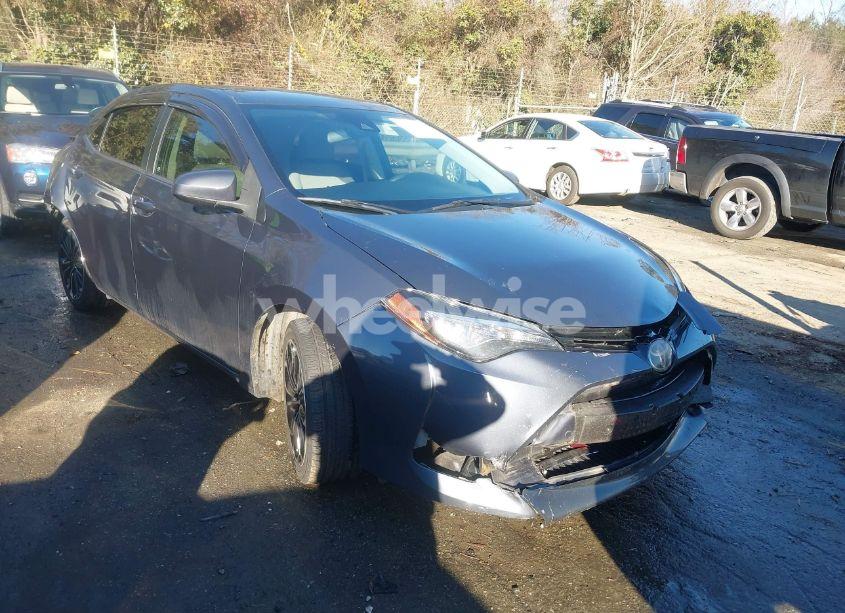 2017 Toyota Corolla LE (VIN 5YFBURHE6HP700415) main photo