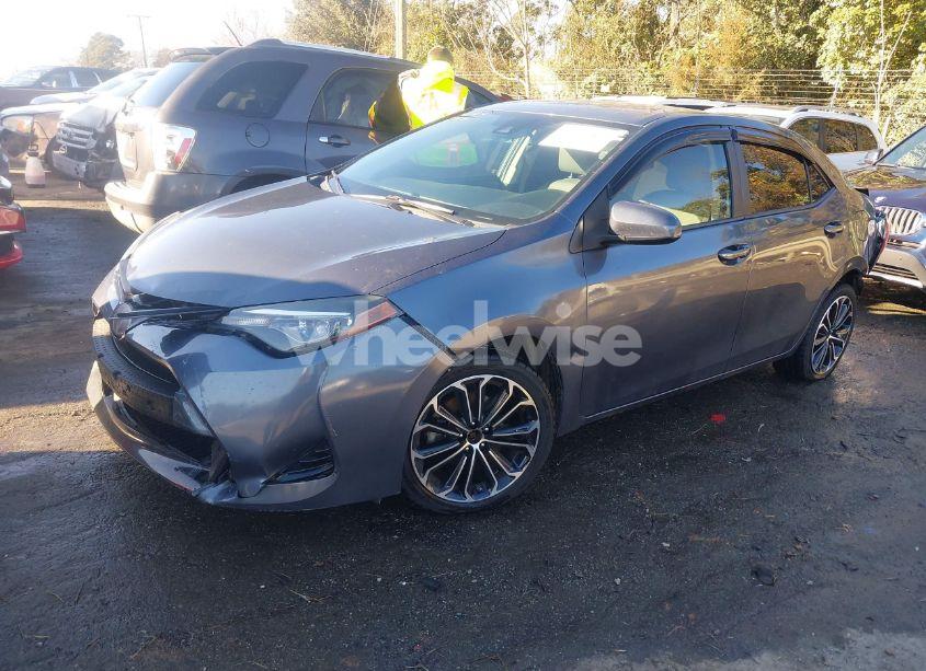 Photo 2 of 2017 Toyota Corolla LE (VIN 5YFBURHE6HP700415)