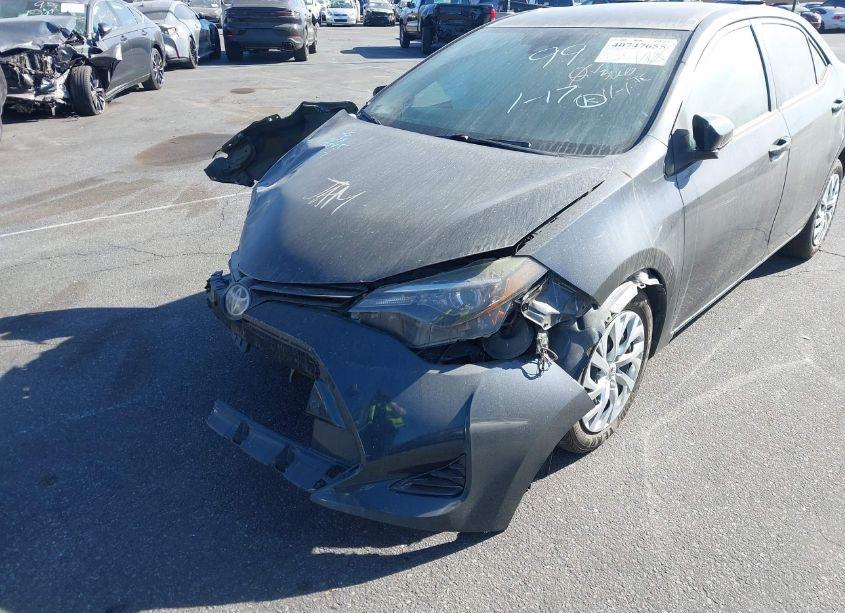 Photo 2 of 2017 Toyota Corolla LE (VIN 5YFBURHE6HP715433)