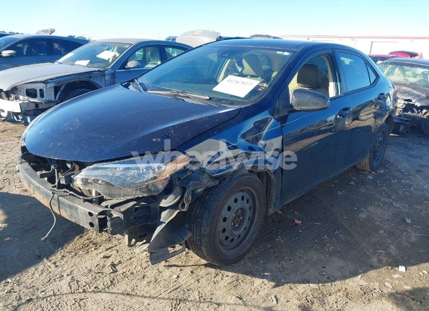 Photo 2 of 2017 Toyota Corolla LE (VIN 5YFBURHE6HP731406)