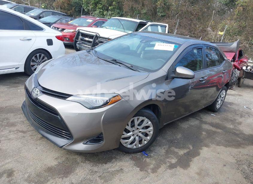 Photo 2 of 2017 Toyota Corolla LE (VIN 5YFBURHE6HP734029)