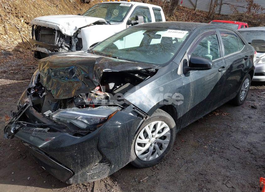 Photo 2 of 2017 Toyota Corolla LE (VIN 5YFBURHE6HP735844)