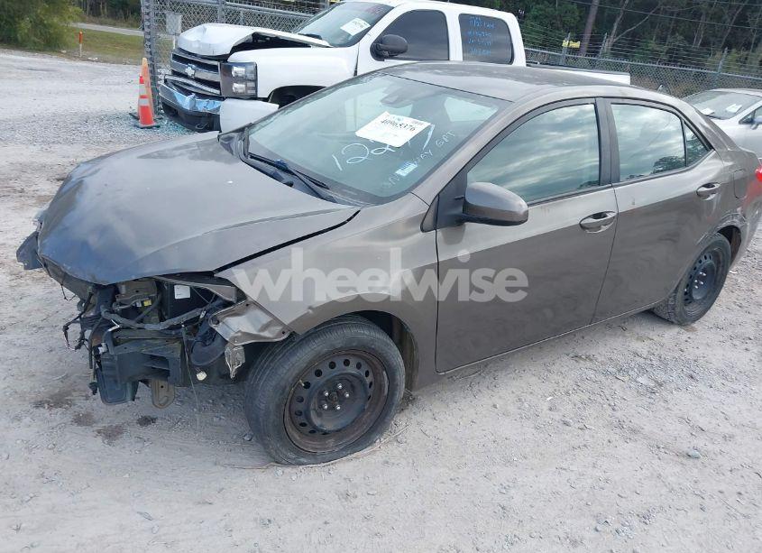 Photo 2 of 2018 Toyota Corolla LE (VIN 5YFBURHE6JP777209)