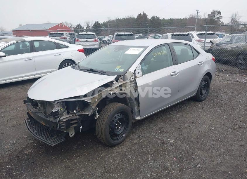 Photo 2 of 2017 Toyota Corolla LE (VIN 5YFBURHE7HP573514)