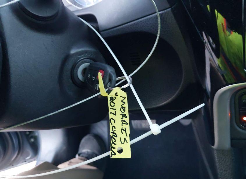 Photo 11 of 2017 Toyota Corolla LE (VIN 5YFBURHE7HP599837)