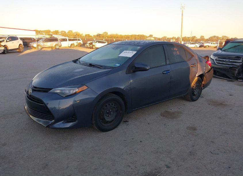 Photo 2 of 2017 Toyota Corolla LE (VIN 5YFBURHE7HP599837)