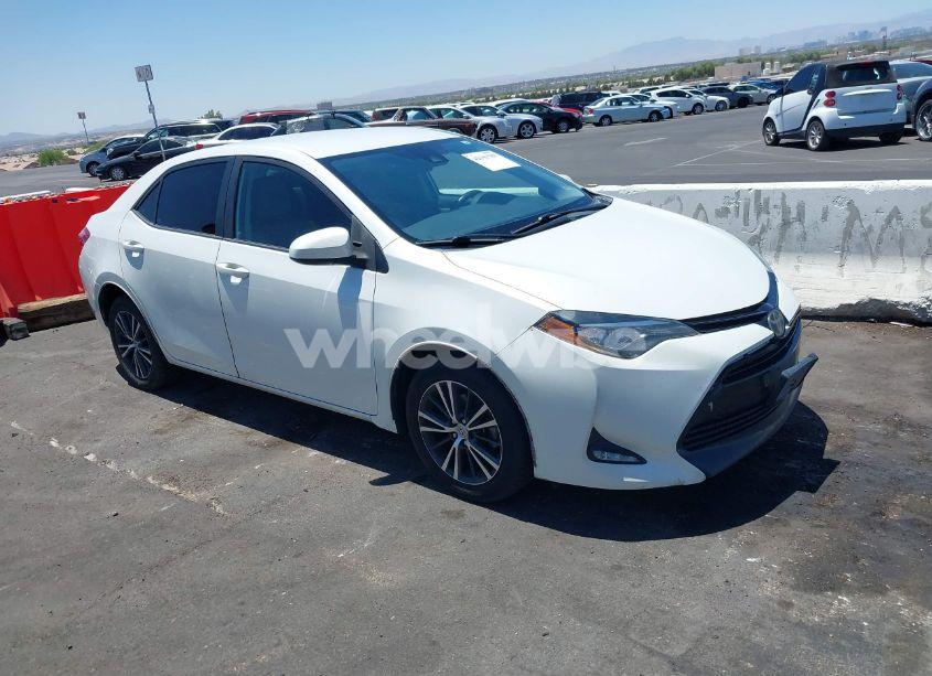 2017 Toyota Corolla LE (VIN 5YFBURHE7HP616233) main photo