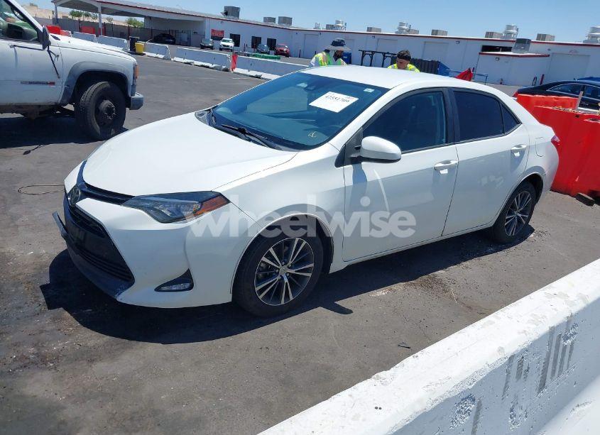 Photo 2 of 2017 Toyota Corolla LE (VIN 5YFBURHE7HP616233)