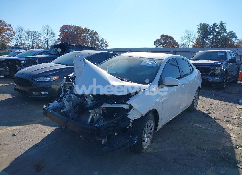 Photo 2 of 2017 Toyota Corolla LE (VIN 5YFBURHE7HP618385)