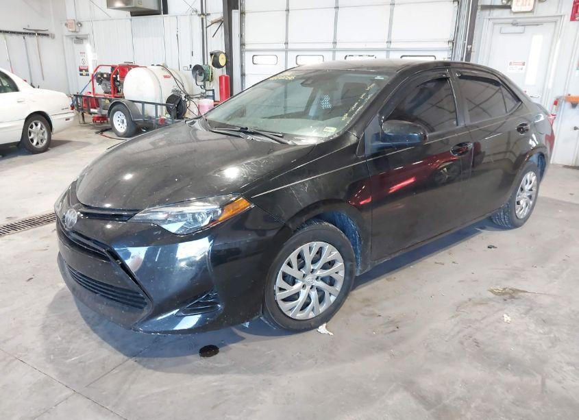Photo 2 of 2017 Toyota Corolla LE (VIN 5YFBURHE7HP653511)