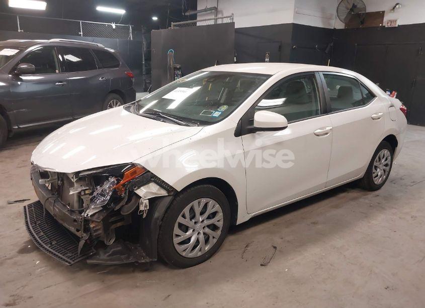 Photo 2 of 2017 Toyota Corolla LE (VIN 5YFBURHE7HP682720)