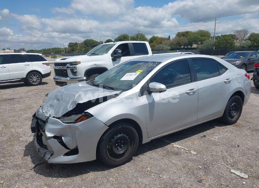 Photo 2 of 2017 Toyota Corolla LE (VIN 5YFBURHE7HP715912)