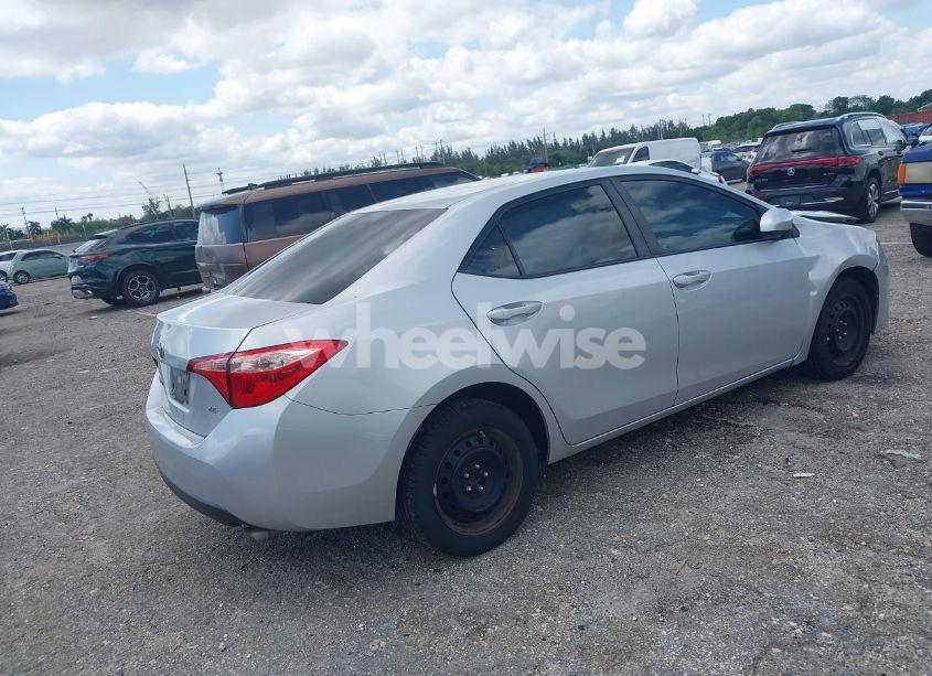 Photo 4 of 2017 Toyota Corolla LE (VIN 5YFBURHE7HP715912)