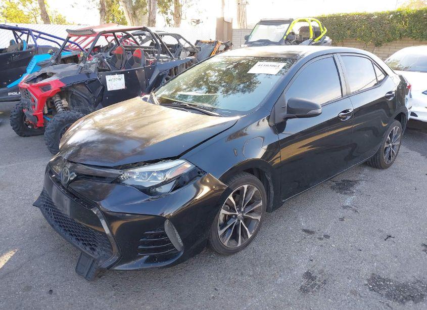 Photo 2 of 2018 Toyota Corolla SE (VIN 5YFBURHE7JP757809)