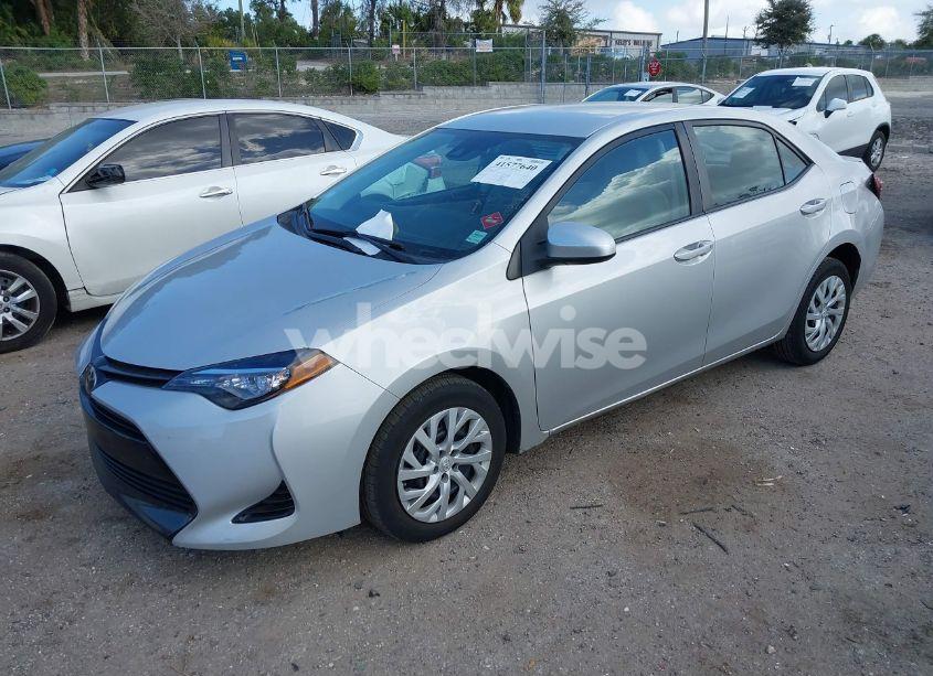 Photo 2 of 2018 Toyota Corolla LE (VIN 5YFBURHE7JP809004)