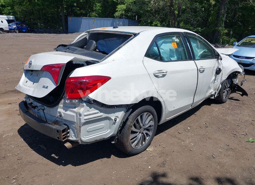 Photo 4 of 2019 Toyota Corolla XLE (VIN 5YFBURHE7KP904888)