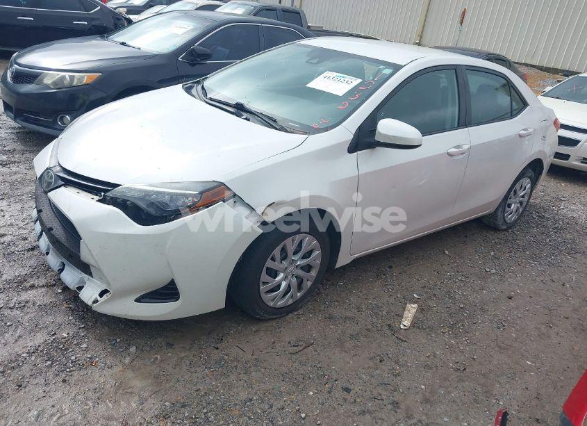 Photo 2 of 2017 Toyota Corolla LE (VIN 5YFBURHE8HP597076)