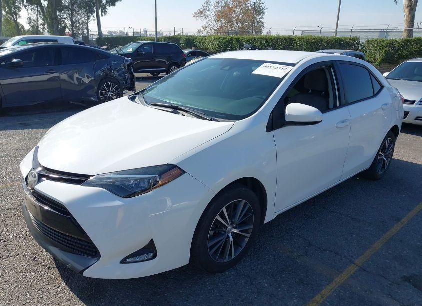 Photo 2 of 2017 Toyota Corolla L/LE/XLE/SE/XSE (VIN 5YFBURHE8HP670821)